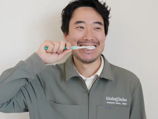 Dr. Howard brushing his teeth